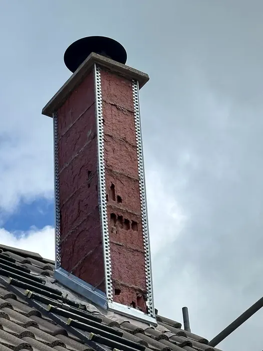 Souche de cheminée en brique avec finitions